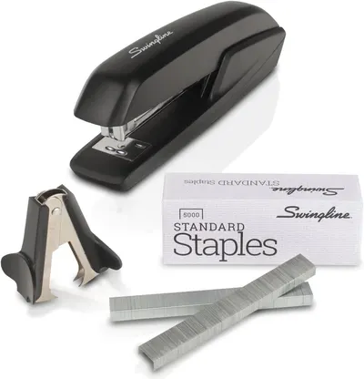 Shows the core stapler product along with included accessories (staple remover and staples) to communicate the complete value of the purchase. Demonstrates that the purchase includes bonus items…