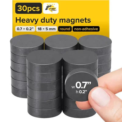 Shows the complete set of 30 heavy-duty round magnets with clear specifications to communicate quantity, size, and type to the shopper. Uses a human hand holding one magnet to provide scale…