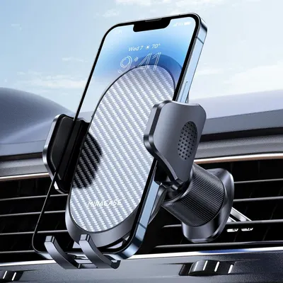 Shows the core product—a car phone mount—holding a smartphone securely in a vehicle vent, demonstrating its primary function and fit for in-car navigation or hands-free use. Displays the product in…