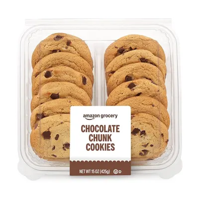 Shows the core sellable product - a container of chocolate chunk cookies - clearly visible so shoppers can see exactly what they are purchasing. Displays the actual retail packaging the customer…
