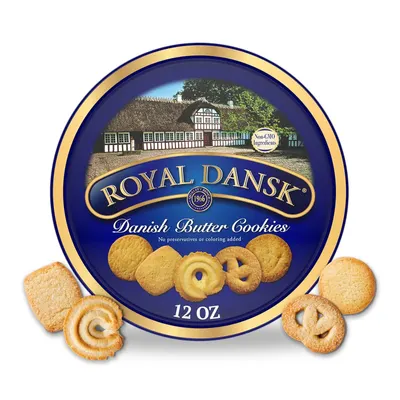 Shows the core product packaging and actual cookies to communicate what the shopper will receive and what the cookies look like. Displays the retail packaging tin that the cookies come in, showing…