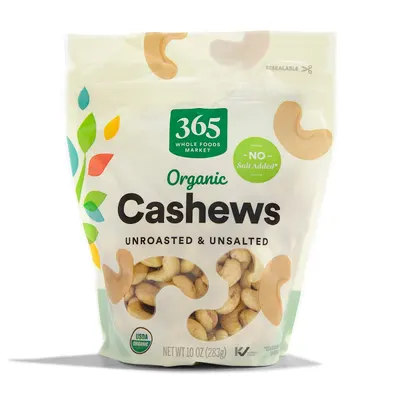 Displays the core product in its retail packaging to show shoppers exactly what they will receive, emphasizing the organic, unsalted, and unroasted nature of the cashews. Shows the physical retail…