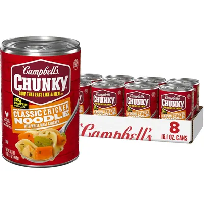 Shows the core product clearly—Campbell's Chunky Classic Chicken Noodle soup—both as an individual can and as an 8-pack bundle, communicating what the shopper will receive. Displays the retail…