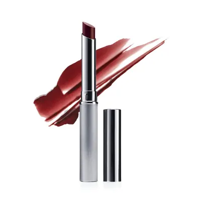 Shows the lipstick product with swatch marks to communicate the actual color and texture the shopper will receive, helping them visualize the product in use. Uses artistic lipstick swatch marks as a…