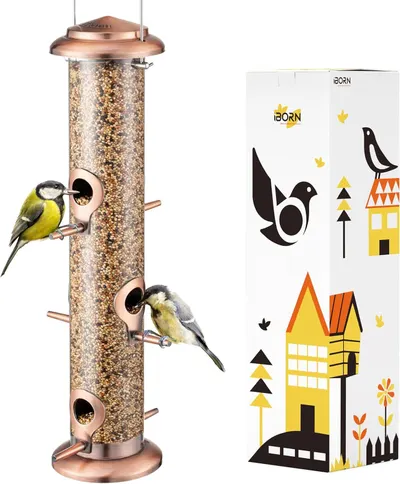 Shows the core product—a copper-toned bird feeder filled with seed and two birds actively using it—to communicate its functionality and appeal to bird enthusiasts. Displays the retail packaging…