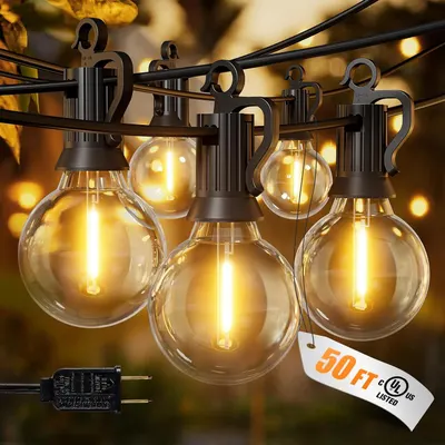 Displays the core product—decorative string lights with clear glass bulbs and black fixtures—to show shoppers exactly what they will receive. Highlights the 50-foot length and UL safety…