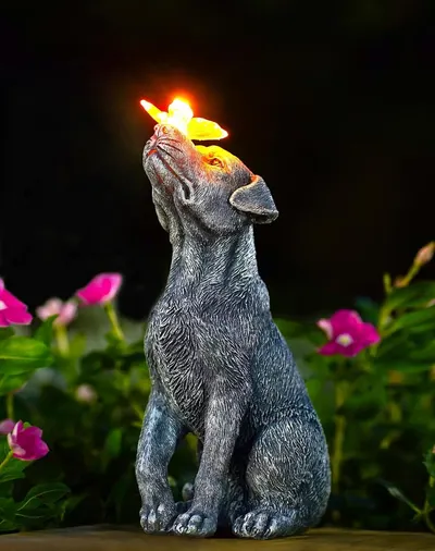 Shows the core product, a decorative dog statue with illuminated flower feature, clearly displayed to communicate its ornamental design and lighting capability. Demonstrates the product's key…