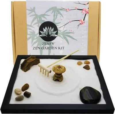 Shows the complete zen garden kit with all included components (tray, sand, rake, stones, pagoda, bridge) to communicate the full value and contents of the purchase. Displays the decorative retail…
