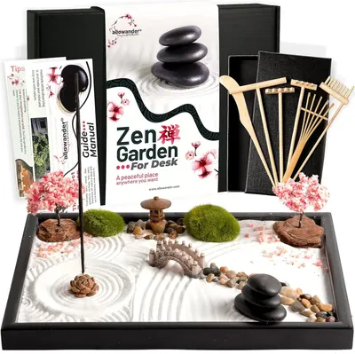 Displays the complete Zen Garden desk kit with all included components (sand tray, stones, miniature trees, bridge, rake tools, and packaging) to show shoppers exactly what they will receive and how…