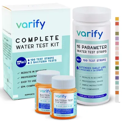Shows the complete water testing system including the box, test strip bottle, and bacteria test bottles to communicate the full kit contents and comprehensive testing capability. Displays the retail…