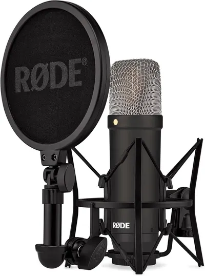 Displays the complete microphone setup to show shoppers exactly what the product looks like and what accessories are included for professional recording. Shows the included accessories that come…
