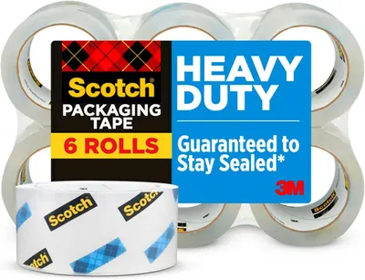 Shows the core product clearly - a 6-roll pack of Scotch Heavy Duty Packaging Tape - to communicate what the shopper is purchasing. Displays the retail packaging sleeve that holds the tape rolls…