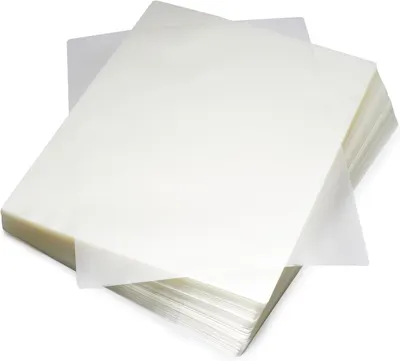 Shows the core product clearly on a white background, displaying multiple laminating pouches in different sizes to communicate what the buyer will receive.