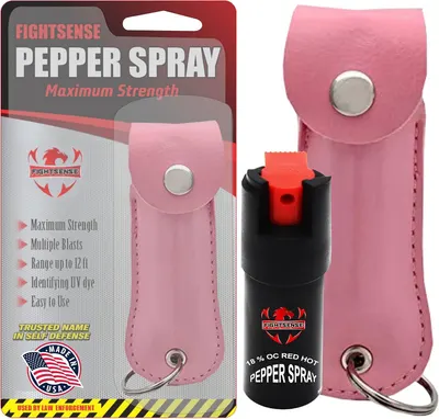 Shows the core product - a pepper spray canister with its pink leather carrying case - clearly displayed both in packaging and out of package to communicate what the buyer will receive. Displays the…