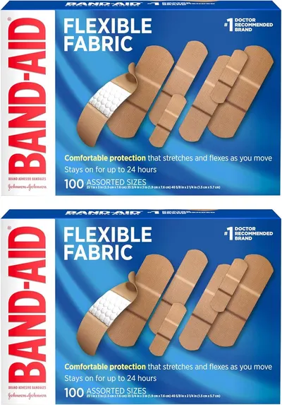 Shows the retail packaging to help shoppers identify the product on store shelves and understand what they will receive when purchasing. Displays the core product (adhesive bandages) in multiple…