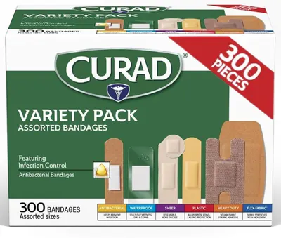 Shows the retail packaging to communicate the product is a variety pack with 300 assorted bandages, helping shoppers understand what they will receive and the value of the multi-type offering.…