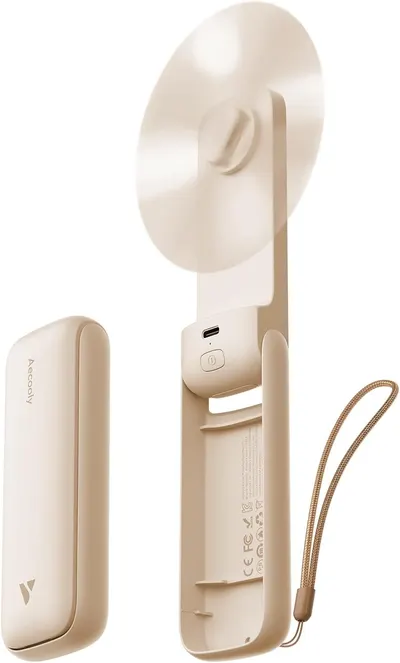 Shows the core product - a portable handheld fan with its charging case and wrist strap - to communicate what the buyer will receive and demonstrate its compact, travel-friendly design. Displays the…