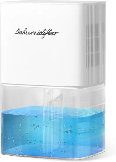 Shows the core dehumidifier product with its transparent water reservoir containing blue liquid and bubbles, demonstrating the device's active moisture collection capability to reassure shoppers of…