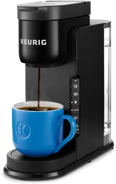 Shows the coffee maker actively brewing coffee into a mug to demonstrate how the product works and what it does, reassuring shoppers about its functionality and ease of use. Displays the core…