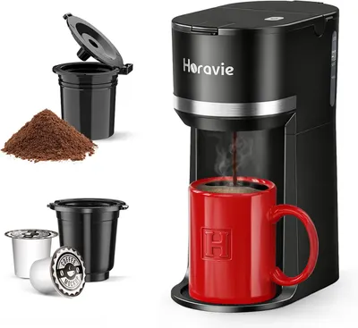Displays the core coffee maker product in action, brewing coffee into the included red mug to show shoppers what they will receive and how it functions. Shows the additional included accessories and…