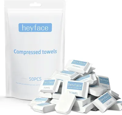 Shows the core product—a 50-piece set of compressed disposable towels in retail packaging—to communicate what the shopper will receive and the quantity included. Displays the retail packaging…