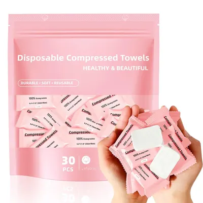 Shows the core product—a 30-piece pack of disposable compressed towels—both in its retail packaging and as individual towel packets held in hand, communicating the product format and key features…