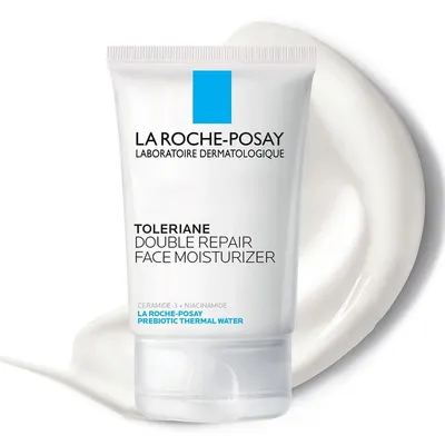 Displays the La Roche-Posay Toleriane Double Repair Face Moisturizer product clearly so shoppers can identify the brand, product name, and packaging format. Shows a cream texture swatch behind the…