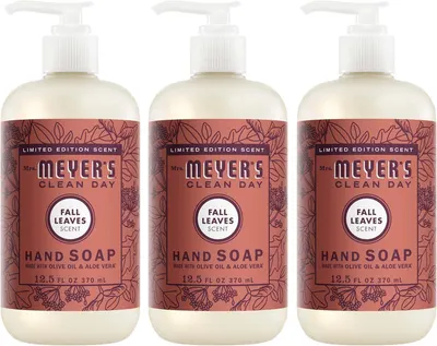 Shows three bottles of the hand soap product to communicate that this is a multi-pack purchase, clearly displaying the Fall Leaves scent variant and Mrs. Meyer's Clean Day branding. Displays the…