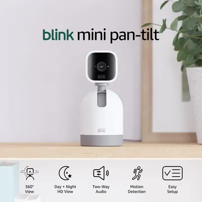 Shows the Blink Mini Pan-Tilt camera system in a lifestyle setting to help shoppers visualize the product in their home while highlighting key features like 360-degree view, day and night HD view,…