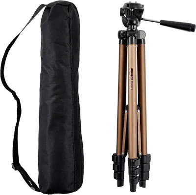 Displays the core product—a camera tripod with fluid head and pan handle—alongside its included carrying case to show what the buyer receives. Shows the included carrying case accessory that comes…