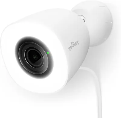 Displays the core sellable product, a white security camera with visible lens and brand logo, in a clean catalog-style composition to show shoppers exactly what they will receive.