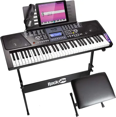 Shows the keyboard bundle with all included accessories—stand, bench, headphones, and tablet holder—to communicate that this is a complete, ready-to-use learning package for beginners. Demonstrates…