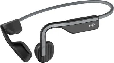 Displays the core product clearly on a white background to show the unique bone conduction headphone design and build quality. Uses a subtle drop shadow to ground the product and give it visual…