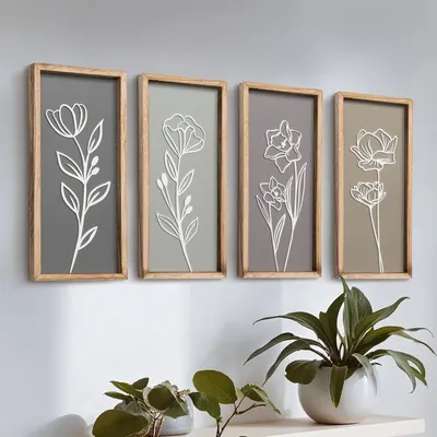 Shows the core product—a set of four framed floral wall art pieces—displayed in a lifestyle setting to help shoppers visualize the complete set and its aesthetic appeal. Demonstrates how the wall…