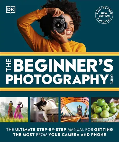 Shows a person actively using the camera to demonstrate how the product works and provide scale context, making the photography guide feel approachable and relatable to beginners. Presents the book…