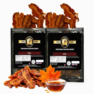 Displays the core product (two packages of maple-flavored uncured bacon jerky) with the actual product shown both in packaging and out of package to communicate what the buyer receives. Uses visual…