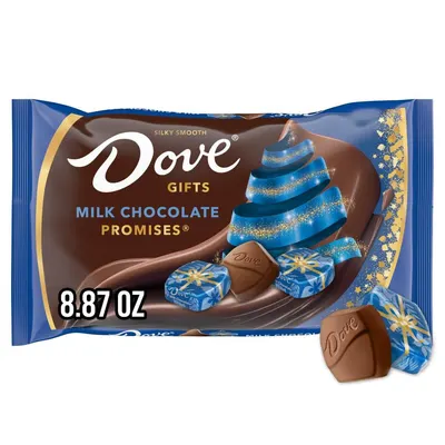 Shows the Dove Gifts Milk Chocolate Promises bag and individual wrapped chocolates to communicate the product offering and festive holiday theme, helping shoppers identify the product and its…