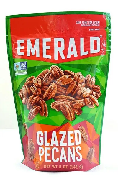 Shows the core product—glazed pecans in a resealable pouch—to communicate what the shopper is purchasing and highlight the convenience of the resealable feature. Displays the retail packaging with…