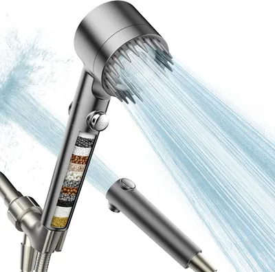 Demonstrates the shower head's built-in filtration system with visible filter layers and active water flow, reassuring shoppers that the product purifies water for healthier showering. Uses added…
