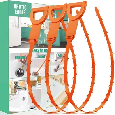 Shows the core product—a set of orange flexible drain cleaning tools with serrated edges—clearly displayed so shoppers can see what they are purchasing. Displays the retail packaging with brand name…