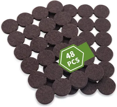 Shows the core product clearly - a 48-piece set of brown felt furniture pads displayed on a white background to communicate quantity and appearance. The green hexagonal badge with 48 PCS text is a…