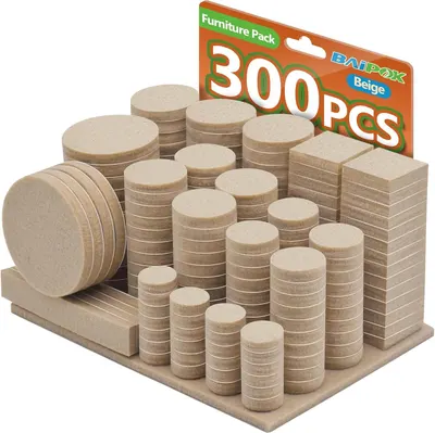 Shows the complete 300-piece furniture pad set with various shapes (round, square, rectangular) and sizes to communicate the variety and quantity included in the purchase. Displays the retail…