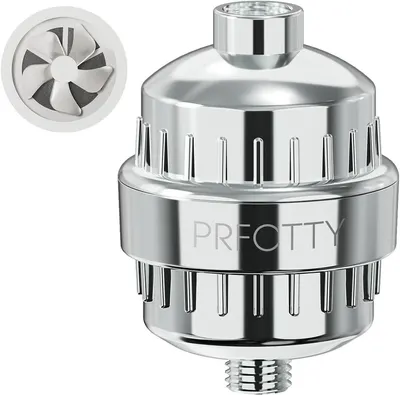 Displays the core product, a chrome shower filter attachment with visible filtration pins and internal mechanism, to show shoppers exactly what they will receive. Shows the included internal filter…