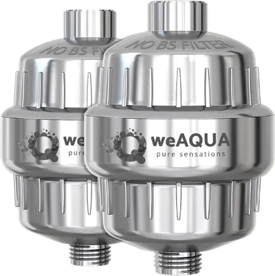 Shows two identical shower filter units clearly displaying the brand and key feature (NO BS FILTER) to communicate the core product being sold as a 2-pack.