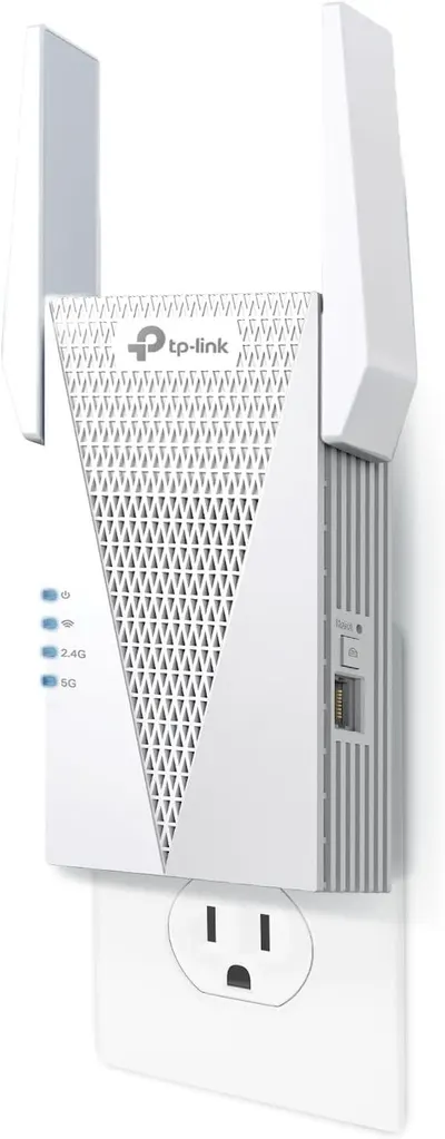 Shows the TP-Link WiFi range extender clearly with its distinctive design, dual antennas, indicator lights for power, WiFi, 2.4G and 5G bands, and wall-plug form factor to communicate the product's…
