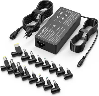 Shows the complete AC adapter kit with all included components to communicate the product's versatility and compatibility with multiple devices. Displays the extensive collection of included adapter…