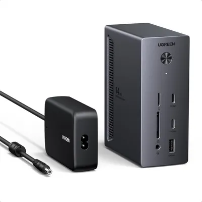 Shows the core product - a UGREEN docking station with multiple ports (USB, HDMI, SD card slots) and its included power adapter, clearly displaying the connectivity options available to the shopper.…