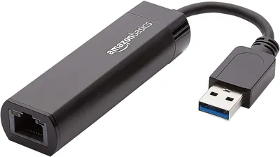 Shows the core product clearly on a white background, allowing shoppers to see the adapter's design, connectors, and AmazonBasics branding.