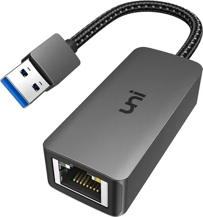 Shows the core product clearly - a USB to Ethernet adapter with braided cable - allowing shoppers to understand exactly what they are purchasing. Uses a subtle drop shadow beneath the product to…