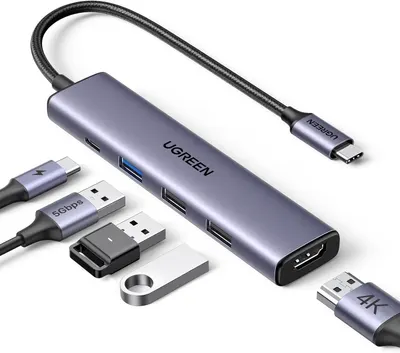 Shows the core product, a UGREEN USB-C hub with multiple connectivity ports, clearly displaying its design and available connections to help shoppers understand what they are purchasing. Displays…